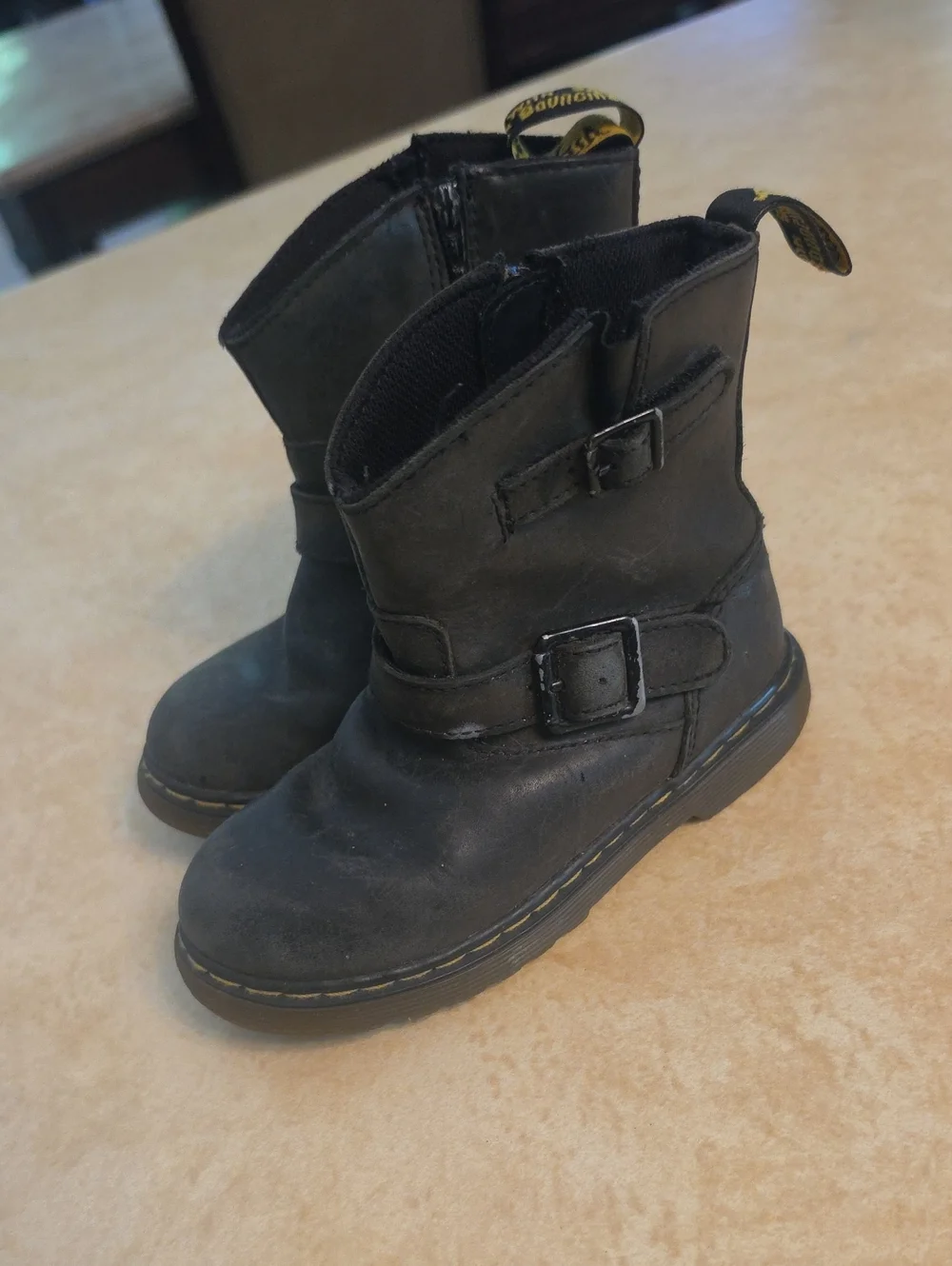 Dr. Martens Kids Black Leather Buckle Boots with Yellow Stitching